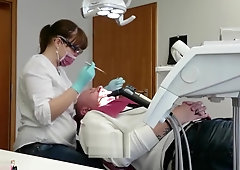 Female dental checkup gloves mask