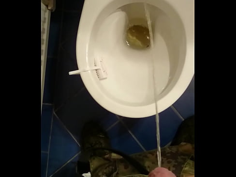 Guy peeing urinal