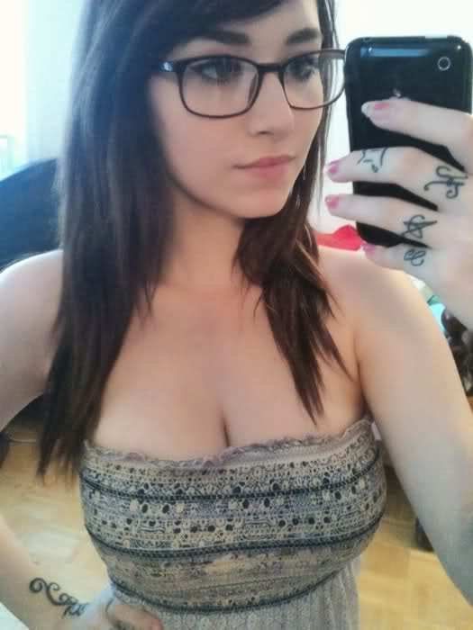 Cute brunette teen wearing glasses