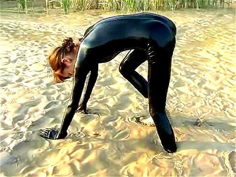 Extreme lesbian latex in the mud