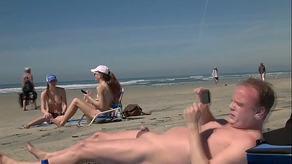 Blonde woman blowjob cock on beach