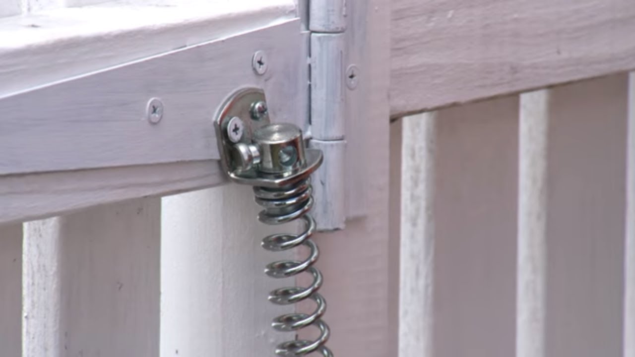 Coil springs for automatic swinging doors