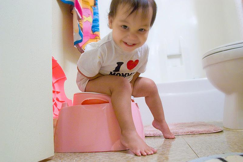 Toddler peeing and pooping out toilet